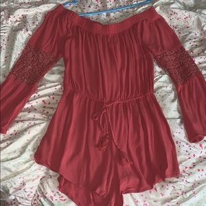 Off the shoulder Pink romper with lace on arms